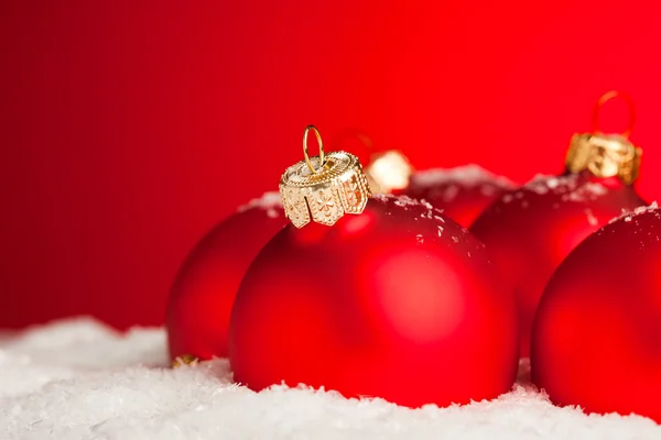 Christmas decoration balls with snow Stock Photo