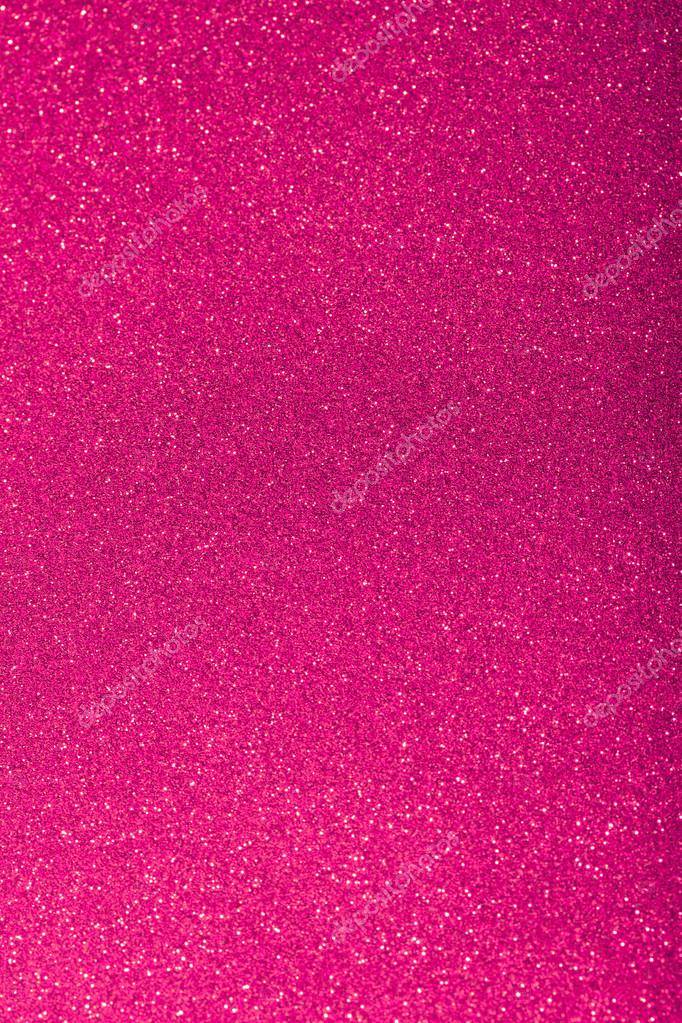 Glitter sparkles dust on background, shallow DOF Stock Photo by