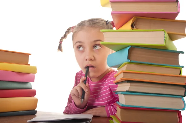 Kleines Mädchen und Bücher — Stockfoto