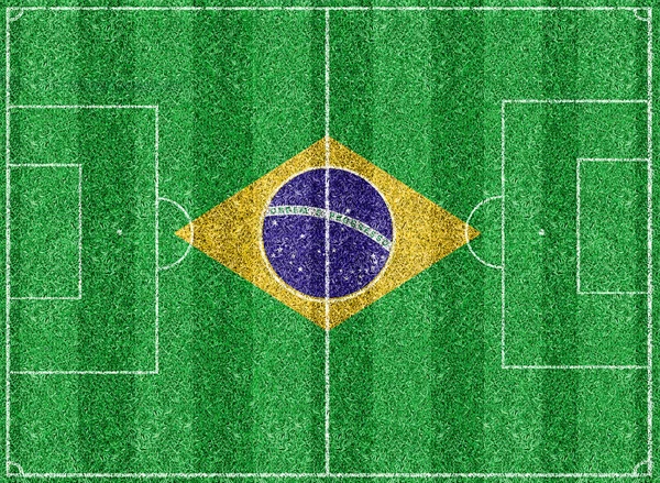 サッカーのフィールド上のブラジルの国旗 — ストック写真