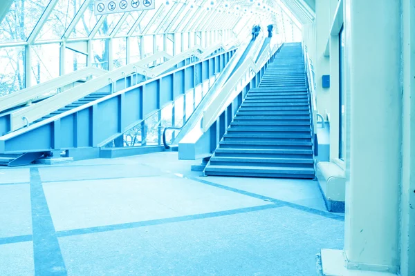 Blue modern escalator in business center — Stock Photo, Image