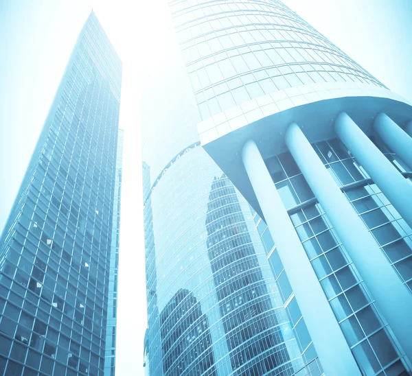 Modern glass silhouettes of skyscrapers at night — Stock Photo, Image