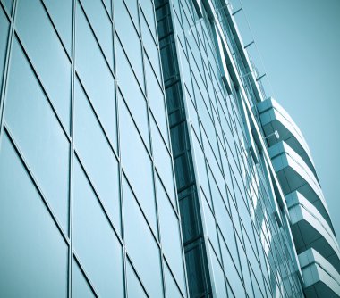 donkere getextureerde ruit hedendaagse architecturale gebouw skysc