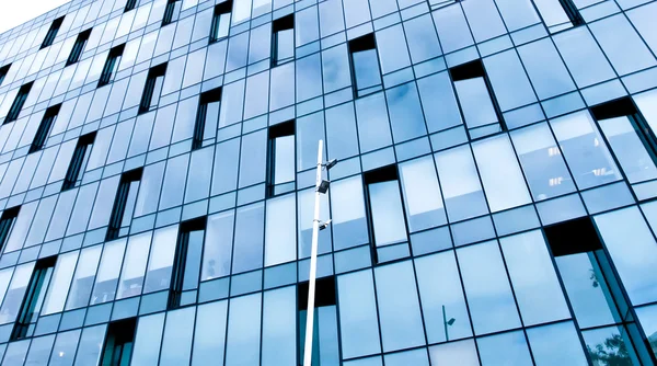 Blue glass wall of skyscraper — Stock Photo, Image