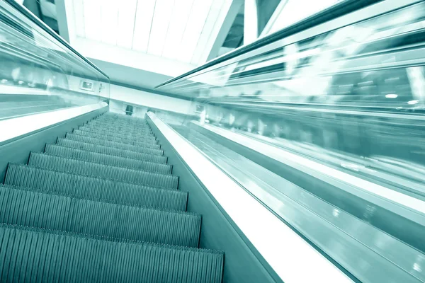 Blue modern escalator in business center — Stock Photo, Image