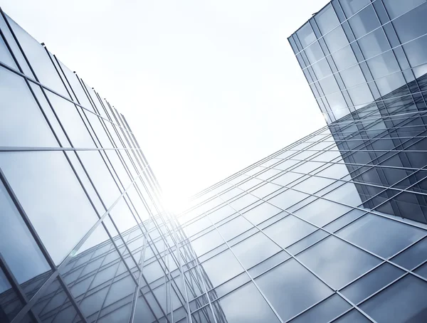 Purple evening texture of glass high-rise building — Stock Photo, Image