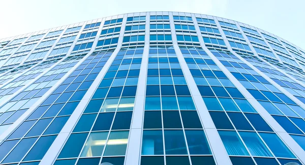 Panoramic transparent glass wall of office building — Stock Photo, Image