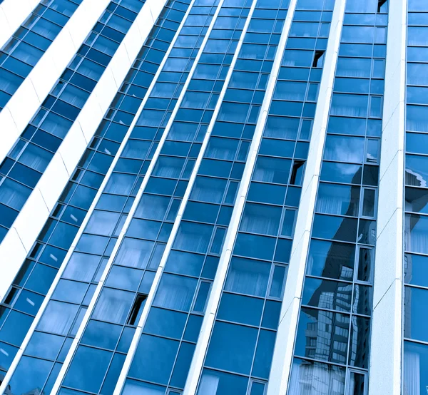 Contemporary striped black texture of glass architecture — Stock Photo, Image