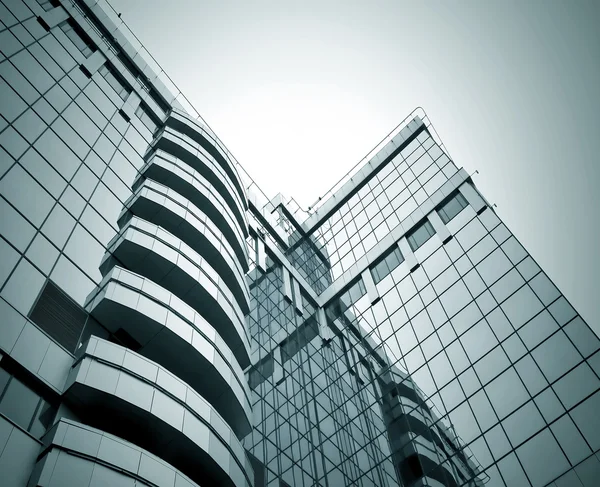 Getextureerde ruit hedendaagse architecturale gebouw skysc — Stockfoto