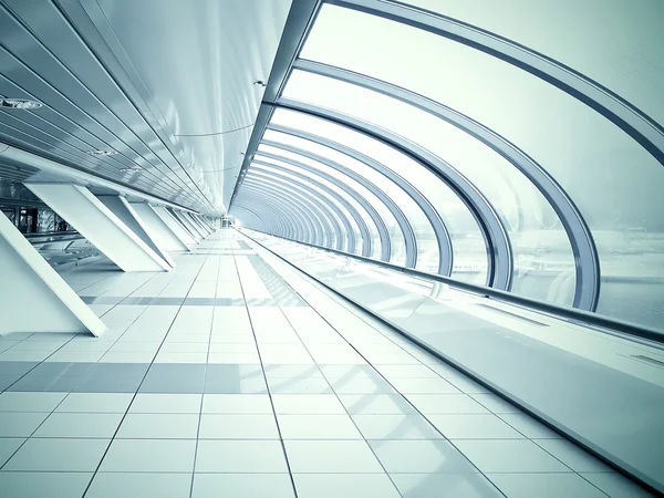 Wide angle view to dark steel tunnel in contemporary airport walkway — Stock Photo, Image