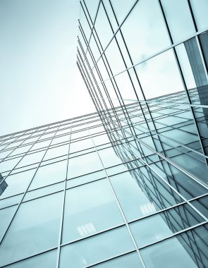 blue glass high rise corporate building clipart