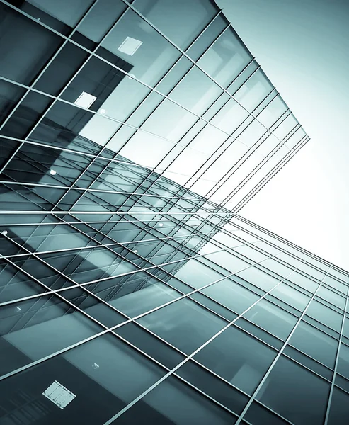 Prospective view to glass high-rise building skyscrapers at nigh — Stock Photo, Image