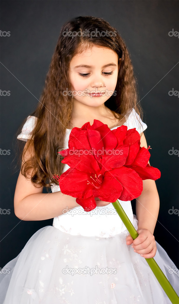 Girl with bright red flower