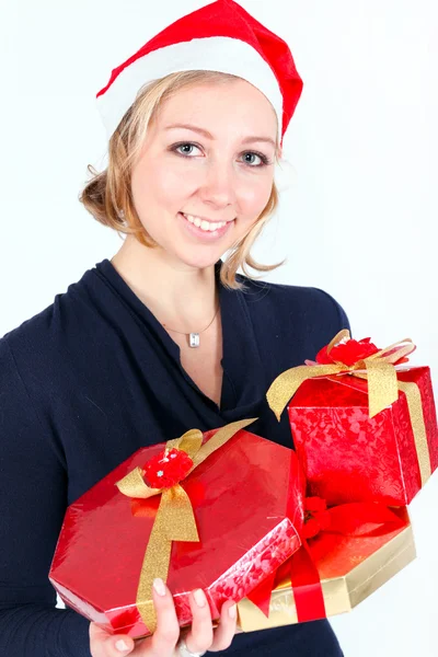 Meisje met kerstcadeaus — Stockfoto