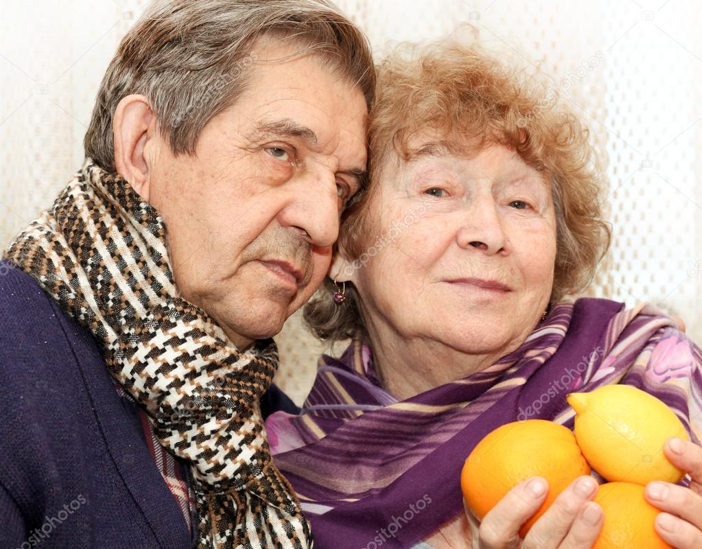 Senior couple with fruit