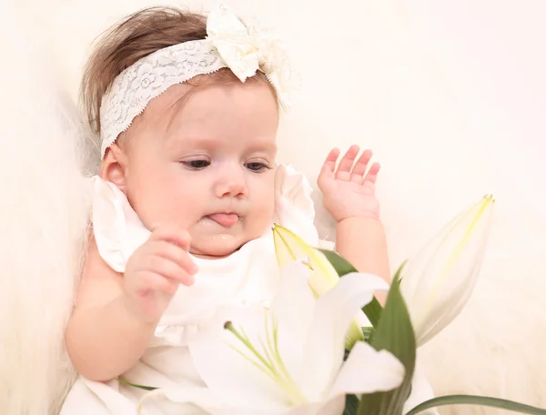 Baby girl in white dress — Stock Photo, Image