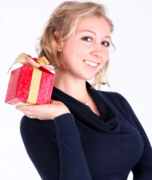 Meisje met kerstcadeaus — Stockfoto