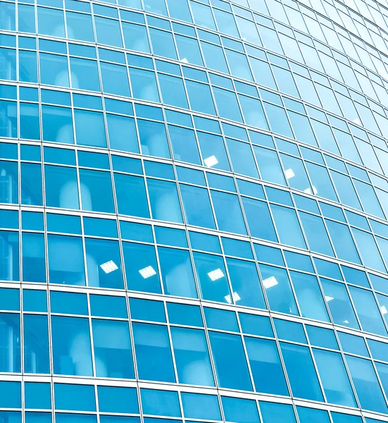 Turquoise texture of glass high-rise building — Stock Photo, Image