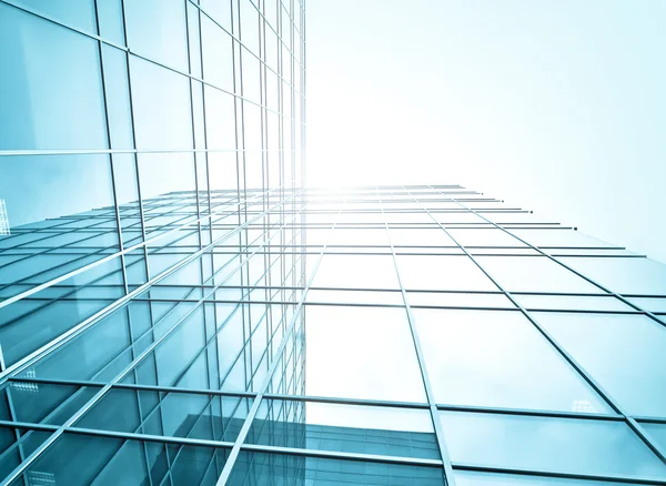 Underside view to steel glass high-rise building — Stock Photo, Image