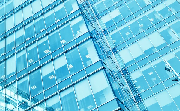 Perspective wide angle view to steel blue background of glass high rise building skyscrapers — Stock Photo, Image