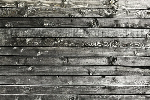 Fondo de una vieja textura de madera desordenada y grumosa — Foto de Stock