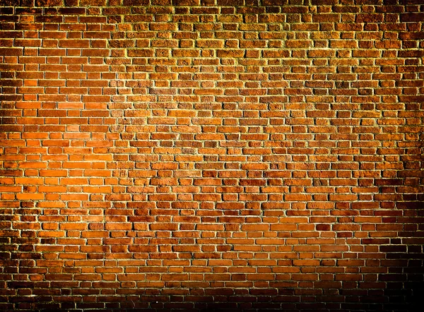 Grungy texturizado parede de pedra vermelha dentro de idade negligenciada e deserta — Fotografia de Stock