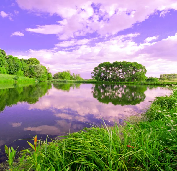 Beautiful evening picturesque scene of rural lake — Stock Photo, Image