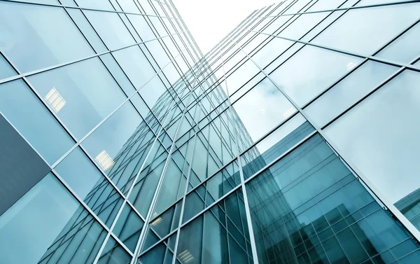 Glassy texture of tilt view to contemporary turquoise glass busi — Stock Photo, Image