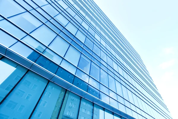 Transparent glass wall of office building — Stock Photo, Image