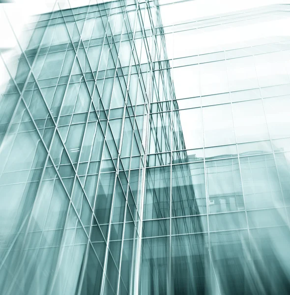 Panoramic and perspective wide angle view to steel blue background of glass high rise building skyscrapers in modern futuristic downtown at night Business concept of successful industrial architecture — Stock Photo, Image