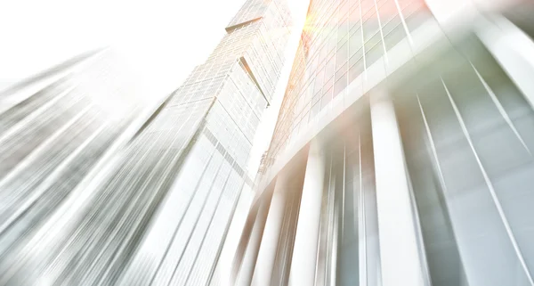 Panoramic and prospective wide angle view to steel light blue background of glass high rise building skyscraper commercial modern city of future. Business concept of successful industrial architecture — Stock Photo, Image