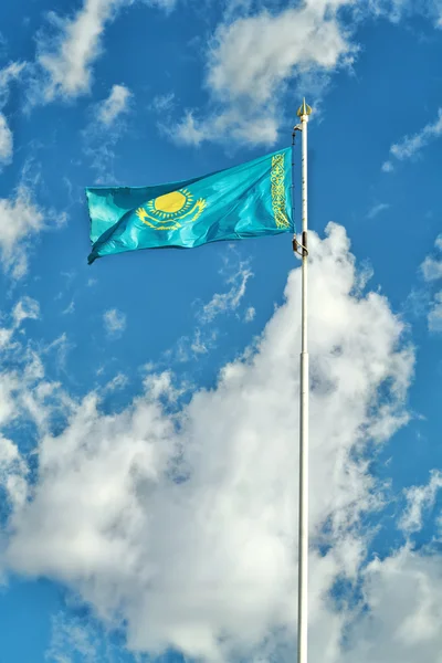 Kazakhstan flag on the background of sky. — Stock Photo, Image