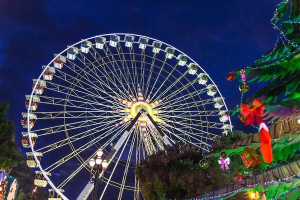 Christmas decoration and ferries wheel in Nice, France — Stock Photo, Image