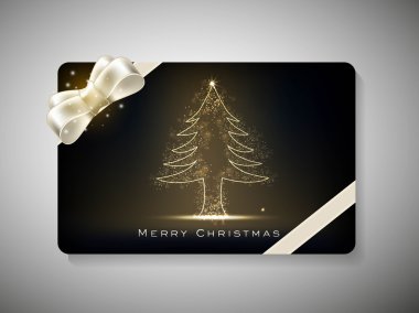 neşeli Noel için kurdele ile güzel bir şekilde dekore edilmiş hediye kartı ce