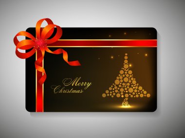neşeli Noel için kurdele ile güzel bir şekilde dekore edilmiş hediye kartı ce