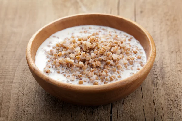 Buckwheat groats with milk — Stock Photo, Image