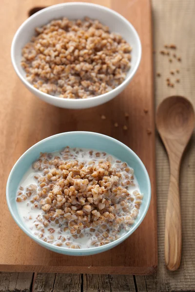 Buckwheat groats with milk — Stock Photo, Image