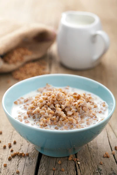 Buckwheat groats with milk — Stock Photo, Image