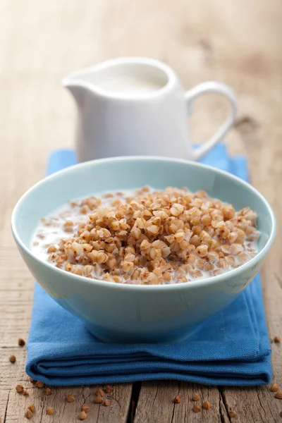 Buckwheat groats with milk — Stock Photo, Image