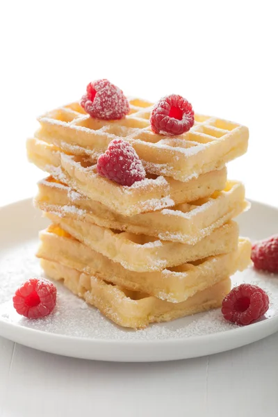 Waffle with raspberry and icing sugar — Stock Photo, Image