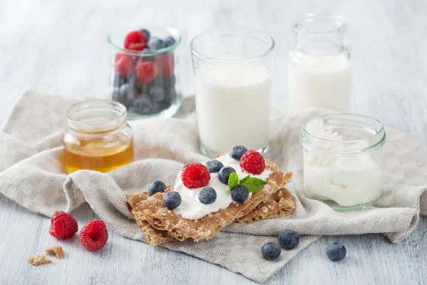 crisp bread with creme fraiche and berries