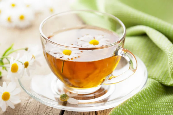 Cup of herbal tea with chamomile flowers — Stock Photo, Image