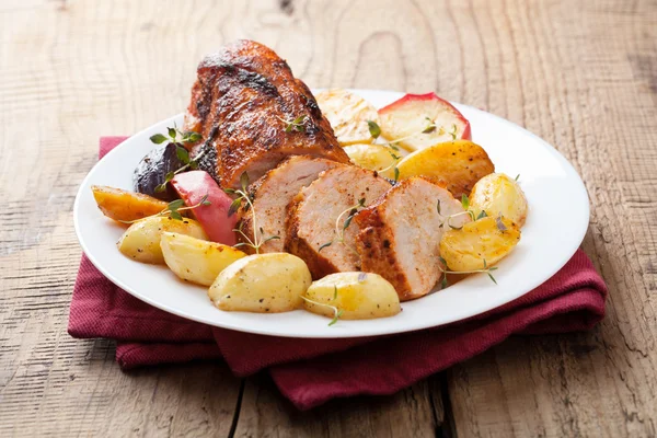 Pork baked with vegetables on a tray — Stock Photo, Image