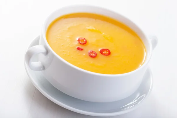 Pumpkin soup in white bowl — Stock Photo, Image