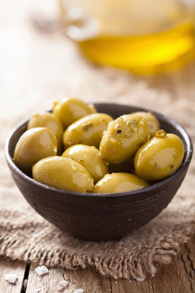 Green marinated olives in bowl — Stock Photo, Image