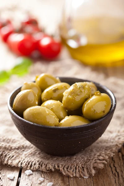 Green marinated olives in bowl — Stock Photo, Image