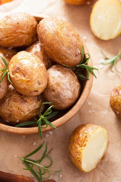 Baked potatoes in wooden bowl — Stock Photo, Image