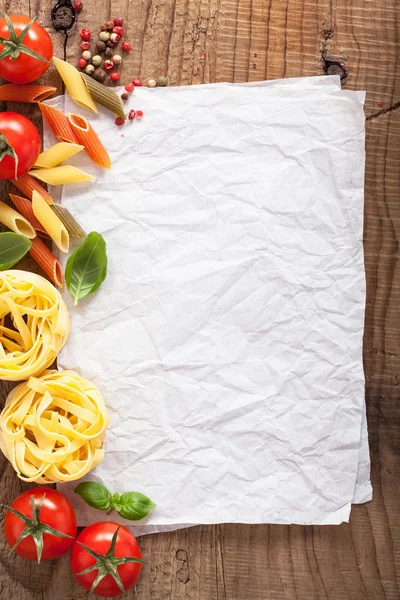 Blank paper for recipes with ingredients tomatoes pasta pepper — Stock Photo, Image