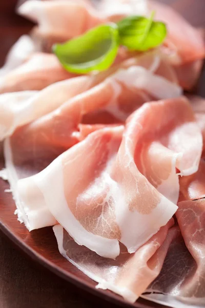 Sliced prosciutto ham — Stock Photo, Image