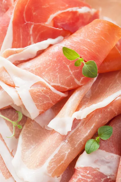Sliced prosciutto ham closeup — Stock Photo, Image